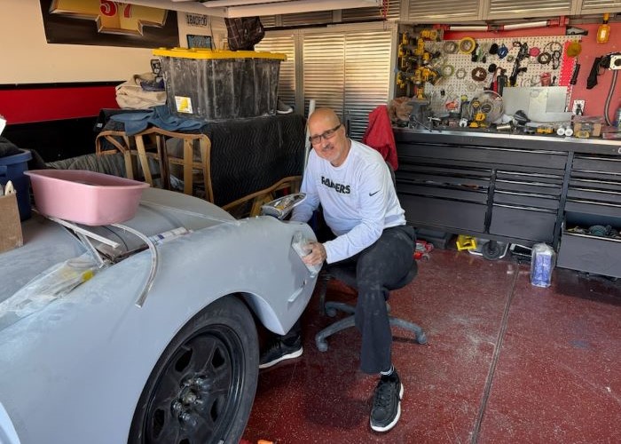 Chaz Berry working on his 1960 Chevrolet Corvette