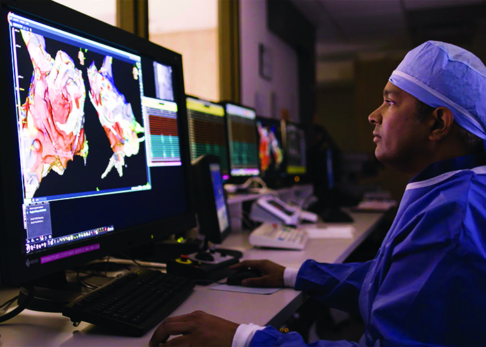  Clinical cardiac electrophysiologist Arjun Gururaj, MD, FACC, performing an ablation procedure.