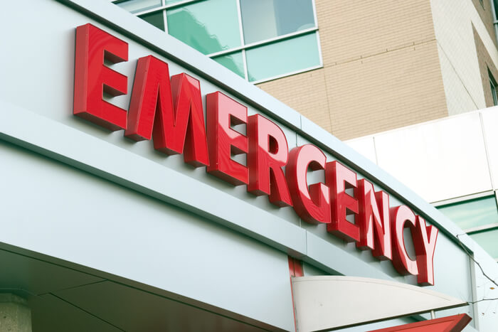 Bright red emergency department sign.