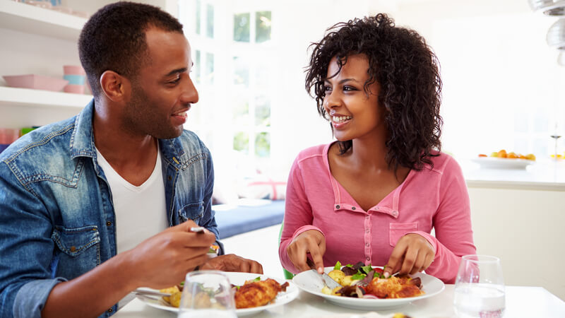 Couple eating a protein dense meal.