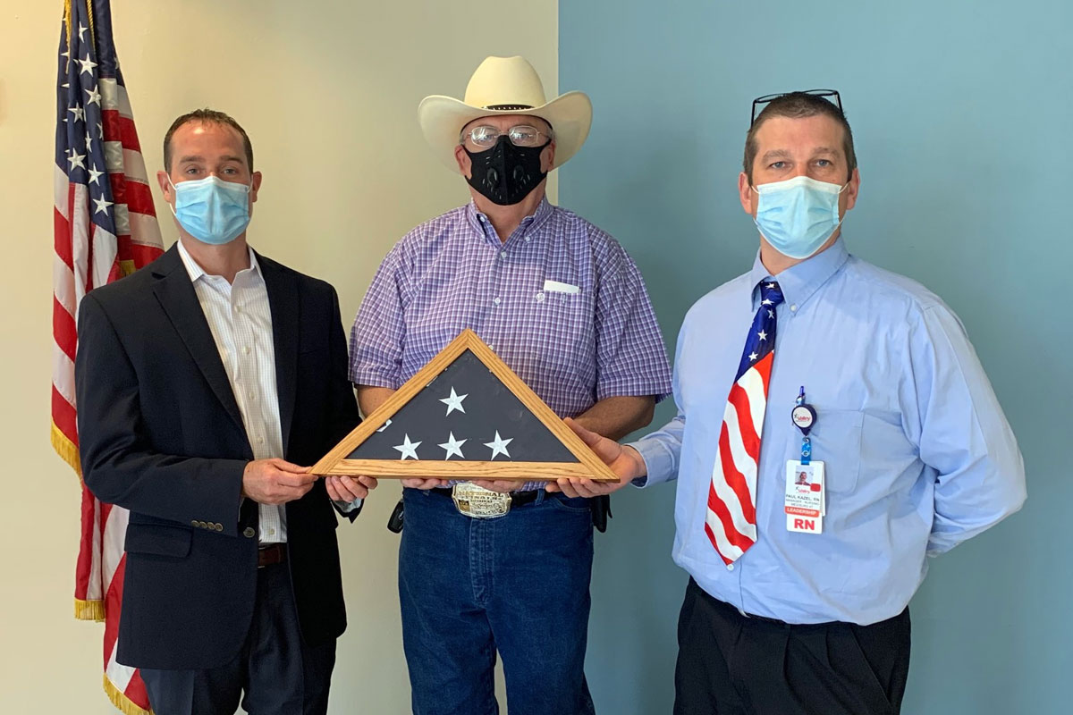 Pictured from left are Valley Hospital CEO Claude Wise, Bill Dolan and Paul Kazel