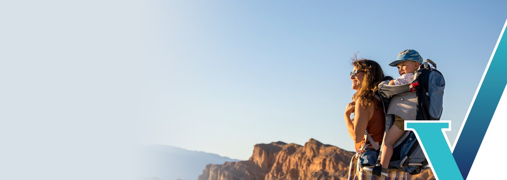 Woman hiking with baby in carrier