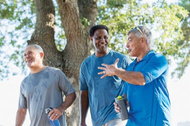 Group of men chatting after a workout
