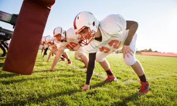 High school football team practice