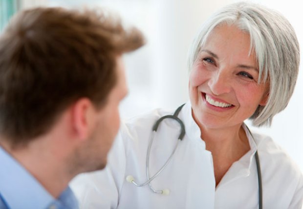 Female doctor smiling at patient