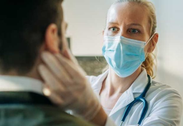 Doctor examining patient