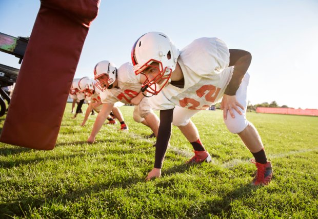 High school football team practice