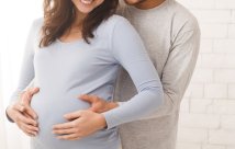 Man hugging his pregnant wife