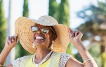 woman wearing hat and sunglasses