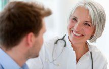Female doctor smiling at patient