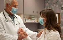 doctor in mask with patient