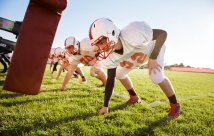 High school football team practice