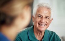 Senior man talking to doctor